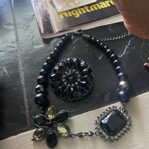 Black jackal w with a pendant